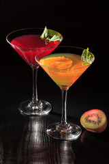 Cherry and orange jelly with lime pieces in the glass topped mint leaves