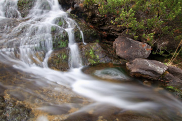 Fototapeta na wymiar Long exposure Alpine wild water
