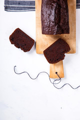 Cake ,Cupcake with Bananas and Chocolate.Homemade Cakes on a light Background.Copy space for Text. selective focus.