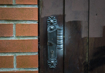 The old vintage door handle and keyhole