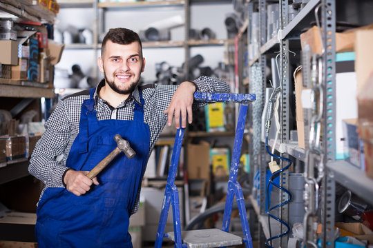 Worker standing in his workshop
