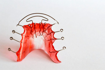 Dental retainer on light background