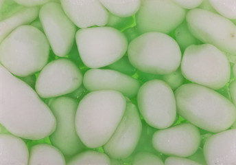 Green tile, stones, clear solution