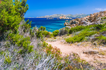 Fototapeta na wymiar Pure clear azure sea water and amazing rocks on coast of Maddalena island, Sardinia, Italy