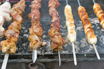 Shish kebab and shashlik on a grill outdoors