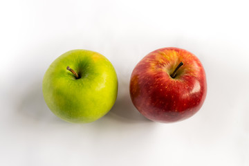 Two apples a green and a red in up view. Different concept. Two different things.