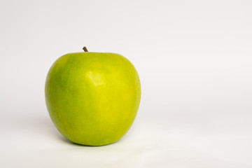 Green apple on a white background (Isolated).