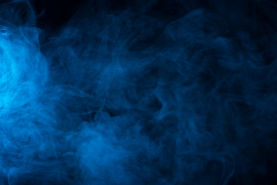 Blue smoke texture on a black background