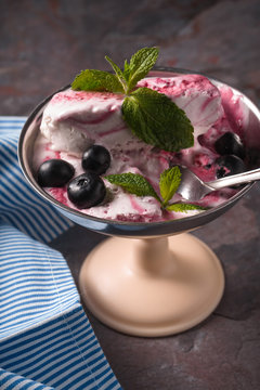 Semifreddo in the retro dessert bowl on the stone table