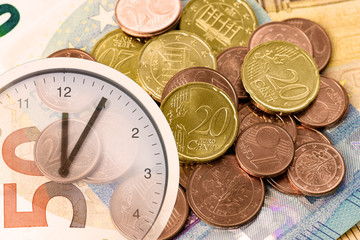 Uhr, Geldmünzen