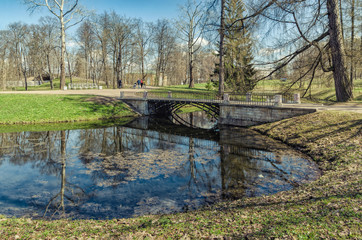 A Spring scenery with the bridge in the Catherine Park in Tsarskoye Selo.