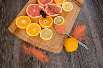 Citrus fruit background with sliced oranges as a symbol of healthy nutrition