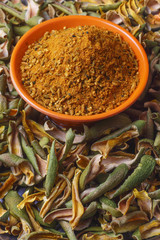 close up of indian achar masala with dry mango  slice
