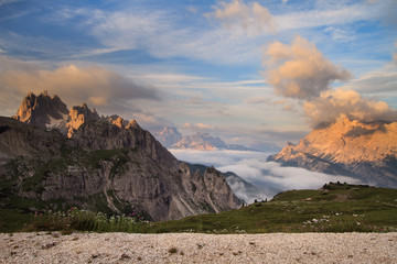 Dolomites sunrise above clouds