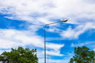 Fototapeta na wymiar Street lamp on blue sky background