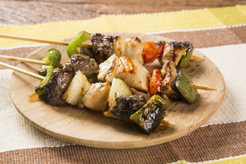 Bbq meat on sticks, kebab skewers with vegetable sticks