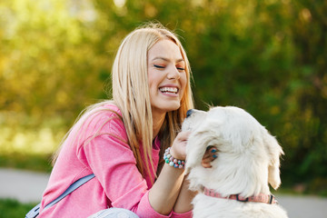Woman enjoying park with dog