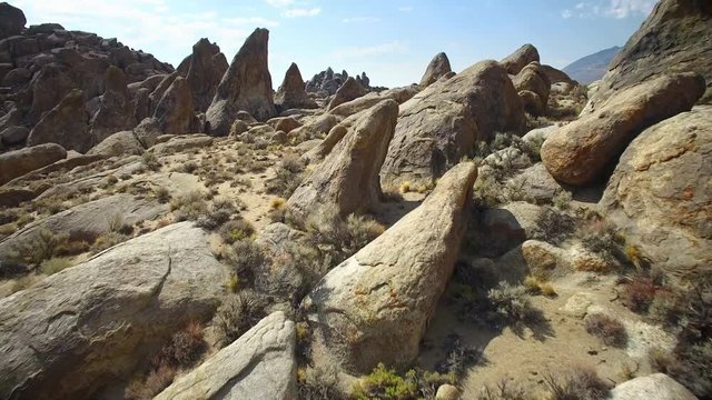 Flying over the amazing rock formations of Alabama Hills in California