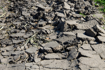 Smashed asphalt. Closeup of broken road
