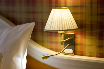 Wall lamp in bedroom.