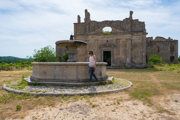 Fototapeta na wymiar Monterano (also known as Ancient Monterano) is a ghost town in Italy , located in the province of Rome, perched on the summit plateau of the hill tuff.