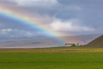 South Icelandic landscape with rainbow