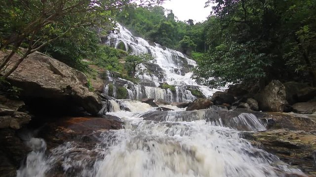 Great waterfall in tropical rainforest at Chiang mai, Thailand.