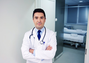 doctor with stethoscope at hospital corridor