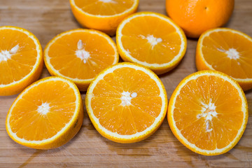 Sliced orange on a wooden board