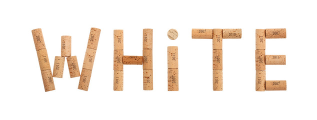Word white shaped by wine corks isolated on white