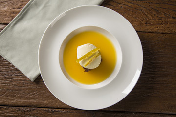 Chocolate cookie with ice cream and orange sauce