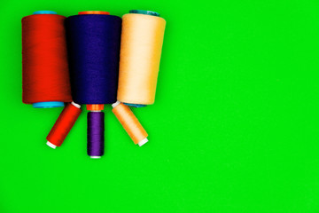 Sewing concept. Colorful sewing spools