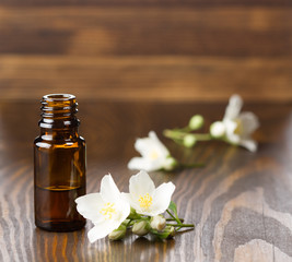 Jasmine essential oil and jasmine flowers