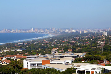 Fototapeta na wymiar Urban Coastal Landscape Against Blue Durban City Skyline