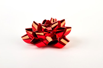Red Christmas bow isolated. Festive bow on white background.