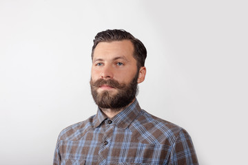 Obraz premium portrait of a young man with a beard and mustache