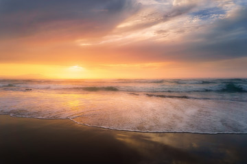 Obraz na płótnie Canvas beach shore at sunset