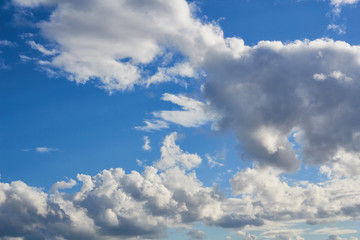 Naklejka na ściany i meble Blue sky with a close-up cloud