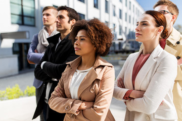 international group of people on city street