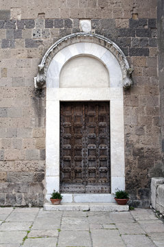 Doorway of the Cathedral in the old Caserta, Italy