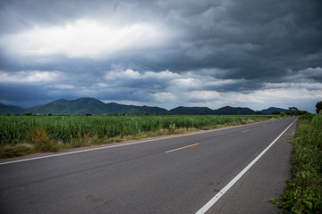 The sky before the storm on Paved asphalt road