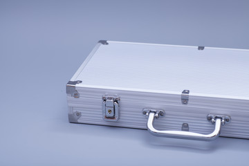 Metal silver case on gray background