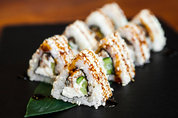Delicious rolls with fish and cheese