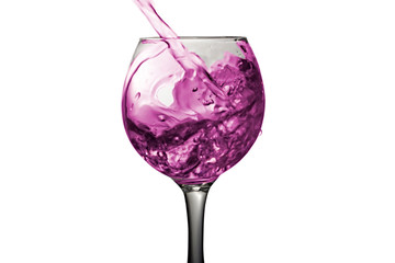 Purple water pours into a glass on a white background