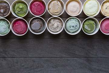 Top view Ice cream flavors in cup on blackground