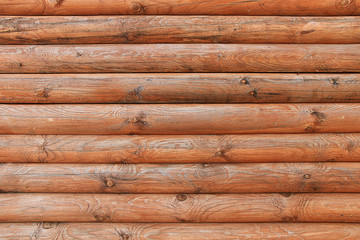 Obraz premium Wall of a wooden house from parallel logs