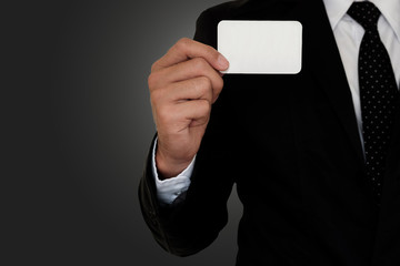 Businessman showing pasteboard.