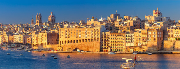 Fototapeta na wymiar Skyline aerial view of Senglea peninsula as seen from Valletta in the sunny morning, Malta.