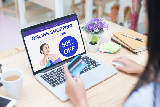 Woman holding cradit card for shopping online at website, Close up to mornitor laptop, woman shopping concept.