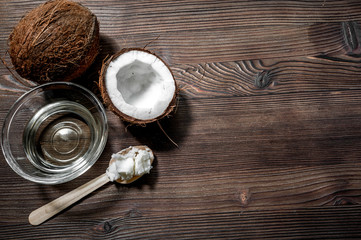 tropical fruits with broken coconut on wooden background space for text